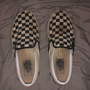 Checkered slip-on vans